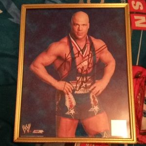 My WWE signed autographed photo of Kurt Angle.